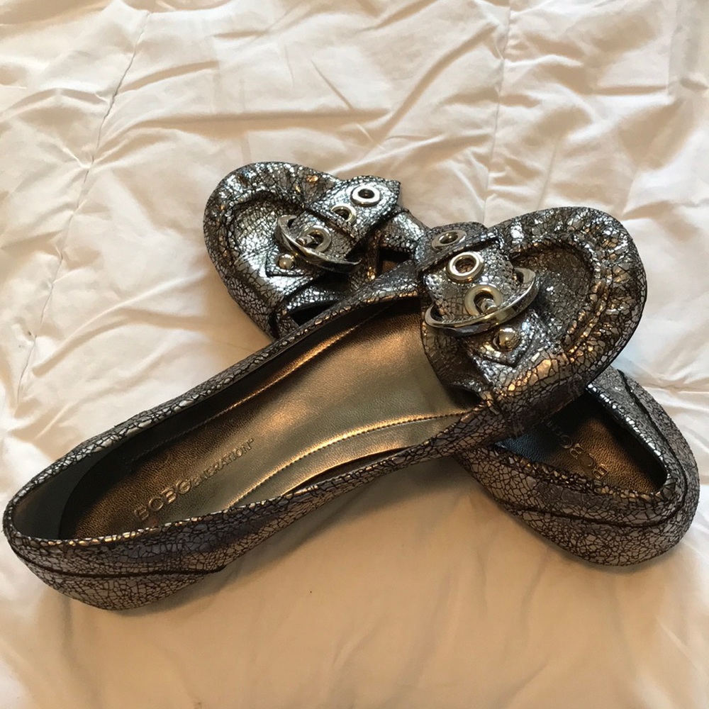 BCBG silver buckle flat. Never worn.